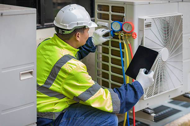 Professional Air Conditioning Repair technician working in Washington Mills, NY